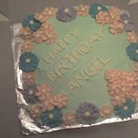 Simple Flowers I really liked how this one turned out. It was one of my first cakes that I was satisfied with. My sister's friend really liked it too...