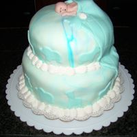 Baby Boy Blanket Tiered Cake This is the baby shower cake I made for our nurse. It's a 2 tiered stacked cake - covered in marbled fondant, w/ a fondant baby &...
