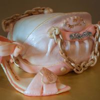 Boginni & Co. Handbag And Shoes This was a cake for my sister's 25th anniversary. 6 layered red velvet cake covered in marshmallow fondant and callebaut chocolate...