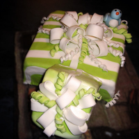 A Little Birdie Told Me....... This cake was one of my first fondant cakes for my friends bridal shower. It was green striped with a little blue bird to match the wedding...