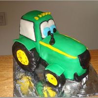John Deere Tractor This was a "smash cake" I made for my nephew's 1st birthday. It's a chocolate cake covered in fondant. The wheels are...