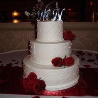 White With Roses 14/10/6 Chocolate/White/MarbleAll buttercream with silk roses. My first time using the diamond imprint mat.