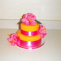 Pink/orange Bridal Shower Cake For a Bride who is getting married somewhere tropical, her colours are pink and orange.