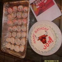 Jon's Chicago Bulls Cake Fondant decoration. I used corn syrup and Wilton Food Coloring for the "paint". What do people use usually?