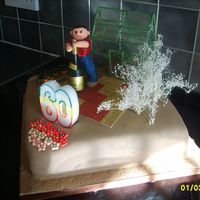 Garden Cake With Greenhouse Fondant covered cake with gumpaste figure and gelatin greenhouse.