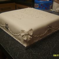 25Th Anniversary My remit here was simple, plain and white. Used white fondant and gumpaste for the bows which were molded from a silicon mould. (Apologies...