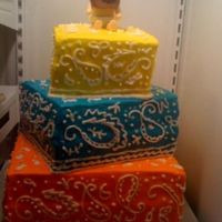 Cowboy Baby Shower This cake is loud! Covered in crusting buttercream, and hand piped with the bandana detail