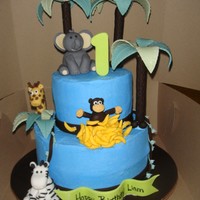 Jungle Cake for a friends little guy's first birthday. Thanks to everyone on cc for the inspiration. buttercream with fondant animals and gumpaste...