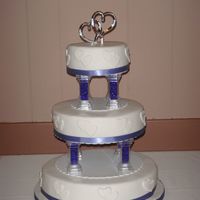 Heart Wedding Cake chocolate cake for my SIL's wedding. Used Ganache under fondant and worked wonderfully.