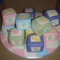 Baby Blocks This was more of an announcement cake then a shower cake... They told their parents that they were pregnant with the cake.. the blocks...
