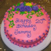 Flower Birthday Cake this was a cake i made for my sisters 20th. it is a yellow cake with purple butter cream filling and all butter cream outside. all the...