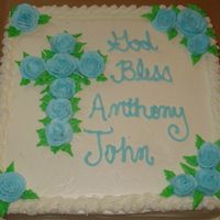 Christening Cake This is a 12 in square yellow cake with cannoli filling and butter cream outside. The roses are also done in butter cream that i prepare...