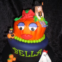 Cute Halloween Topsy turvy Halloween birthday cake for a 4 year old little girl. So fun to make!