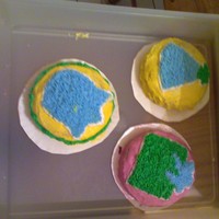 Mini Cakes These are vanilla cakes with mixed berries filling. It is topped with buttercream frosting