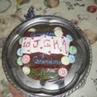 Card Cake This is a picture of the cake I made for my grandparents birthdays. It was my frist try at decorating a cake. The cards and chips are made...