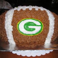 Green Bay Football Wilton football pan x2 to make 3D then added Green Bay Packers logo