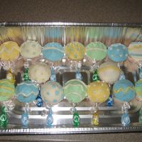 Baby Shower Rattle Cupcakes These are some baby rattle cupcakes that I made for a baby shower using BC and lollipops.