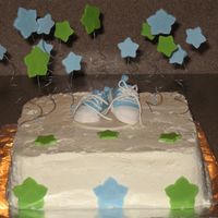 Baby Shower Cake With Converse Shoes This is a cake with gumpaste decorations that I made for a baby shower. I used the Converse shoes template that Stellastarchild posted....