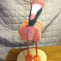 3-D Flamingo Cake I made this cake for a friend's flamingo party. The body is a strawberry cake decorated with buttercream icing. The neck is made from...
