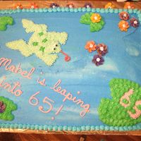 Leaping Into 65 Birthday Cake. Decorated with buttercream.