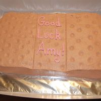 Band-Aid Cake Cake was for our school nurse. Cut in the shape of a band-aid and decorated with buttercream icing. For the indentations of the band-aid I...