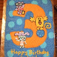 Wow! Wow! Wubbzy! Cake Used the cartoon as inspiration for this third birthday cake. It is decorated in all buttercream.