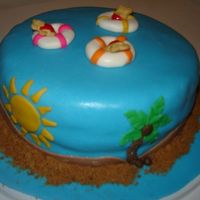 We Are Going To The Beach This was a cake I made for my friend's 12th brthday. They girl was soooo happy with it and it was a lot of fun making the cake for her...