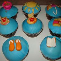 A Day At The Beach Chocolate Zucchini cupcakes with chocolate ganache and decorated with MMF. Had lots of fun making these!