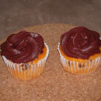 Dscn0187.jpg Orange cupcake with mini chocolate chips and chocolate orange icing.