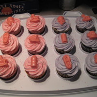 Baby Shower Cupcakes Pink and Purple buttercream, iced with large star tip, pink sugar and pink molded candies on top