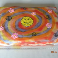 1960's Theme Reunion Cake Full sheet cake that was suppose to represent the 60's. First time using wilton color spray. Looked amazing on the practice boards....