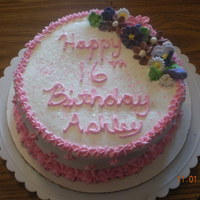 Girl B-Day Cake Chocolate cake with bc icing with RI flowers for my neice's 16th b-day. She wanted something girly but not childish.