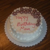 Birthday Cake WASC 8" cake with bc icing. Used RI drop flowers for decoration.