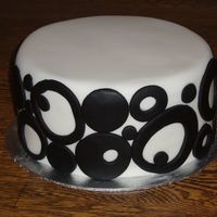 Black Circles On White This is a cake I made for a friend's black tie wine tasting fundraiser. It was delicious - chocolate with vanilla buttercream. I...