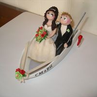 Bride & Groom In Boat 