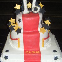 Red Carpet Cake strawberry with velvet ropes around the sides