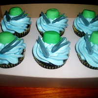 Surgeon Cupcakes Cupcakes topped with surgeon's cap, scalpel, and forceps