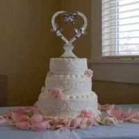 Rose Cake This was my first wedding cake, the roses are fondant.