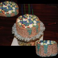 Mom's 2009 Birthday Cake I started with a from-scratch yellow cake that used vanilla bean paste for flavoring. It's two layers, torted and filled with hazelnut...