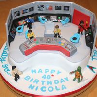 To Baldly Go Hi, I made this cake for my brother-in-law's 40th b-day and we called it 'TO BALDLY GO.....'! Everything is made of fondant...