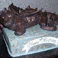 Black Dragon My first dragon! He is made out of rct and covered in fondant, I ended up making him much bigger then I expected, but I think he still...