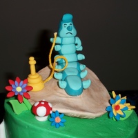 Alice In Wonderland Made this for my sister's 30th. Didn't come out quite as I planned but I'm still happy with it. All items were made with...