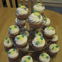 Cupcake Tree Lemon cupcakes placed on a cupcake tree stand