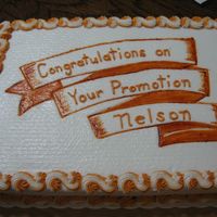 Promotion Cake Promotion cake, bc iced with hand drawn ribbon banner. No flowers for this man.