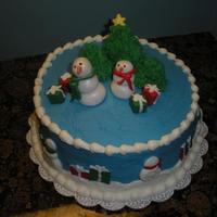 Snowman Christmas Chocolate cake with peppermint mocha buttercream. Made for my mom to take to a teachers' party. Got idea from different cakes here on...