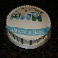Baby Shower Train Cake Strawberry cake with buttercream; fondant accents. I was given a picture of a cake made by Simply Sweets and a napkin (made by Carter'...