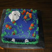 Witch And Ghost Halloween Cake Made for our neighborhood block party. Chocolate cake with cookies and cream filling. Buttercream, witch and ghost made of fondant, candy...