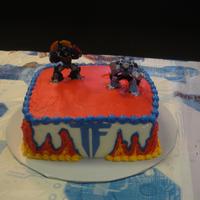 Transformers Cake White Chocolate with milk chocolate truffle filling for twin boys b-day. They had a joint party with their little sister (she had...