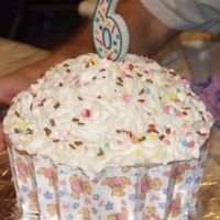 Large Faux Cupcake I made this for my daughter some years ago. It is 2 rounds layered and 1/2 soccer ball. For the muffin 'paper' I scanned in...