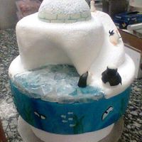 Penguin Holiday Cake This cake is on display at my work. I made it as a show piece to bring in the holiday season.